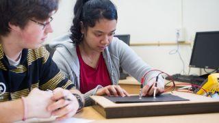 2 students with ee table