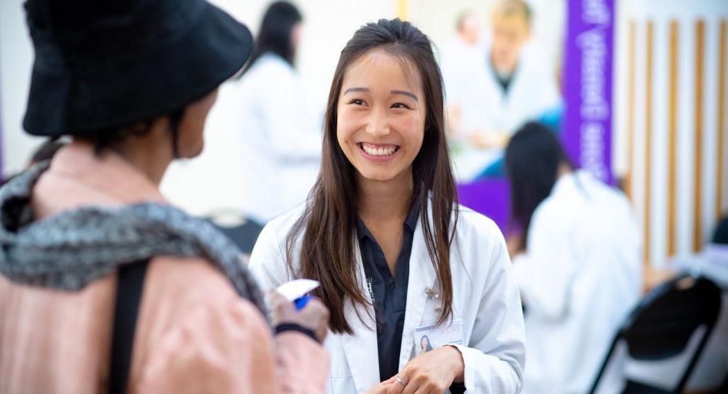 Doctor of pharmacy student with patient at Medicare Part D clinic